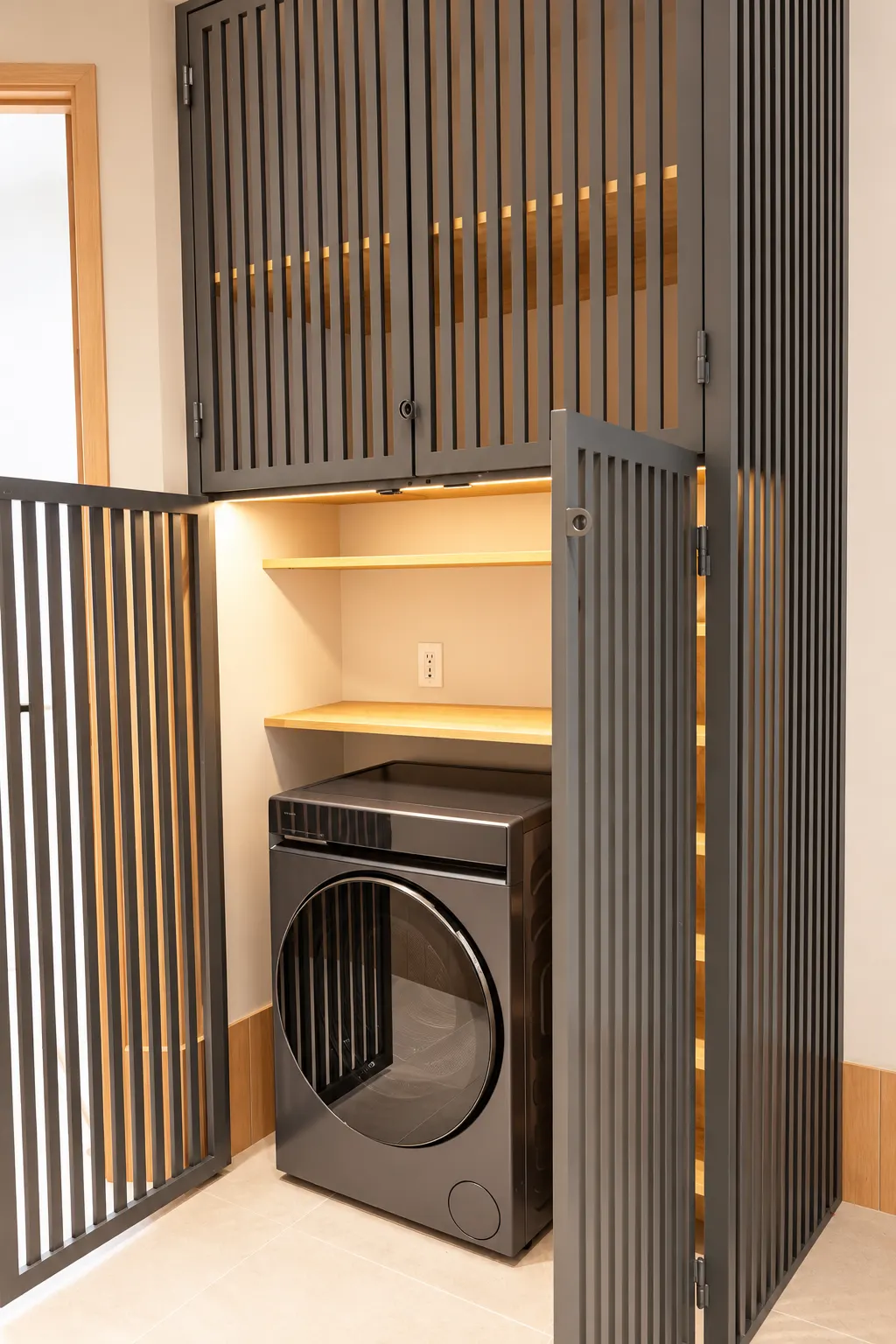 Concealed washer-dryer and utility storage